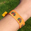 Woven wristband with interwoven RFID tag